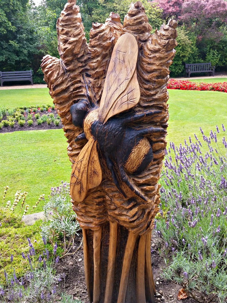 carved bee parsonage gardens disbury