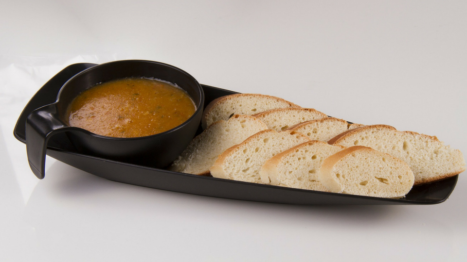 soup with slices of fresh bread
