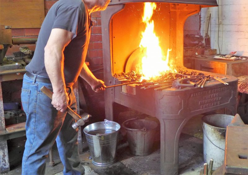 blacksmith working at ellenroad engine house