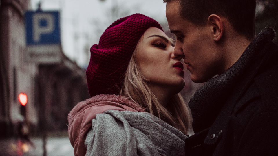 Woman and man kissing